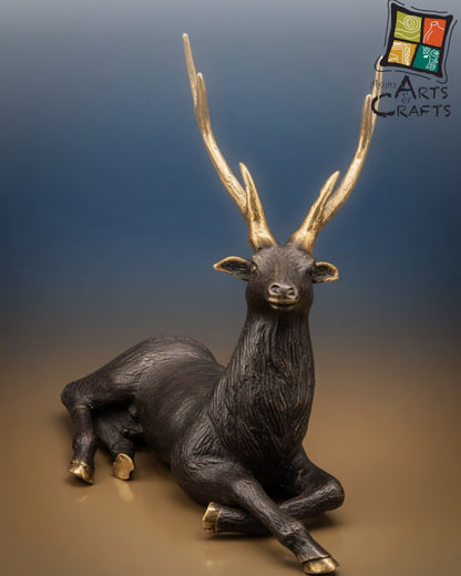 Bronze sitting Deer