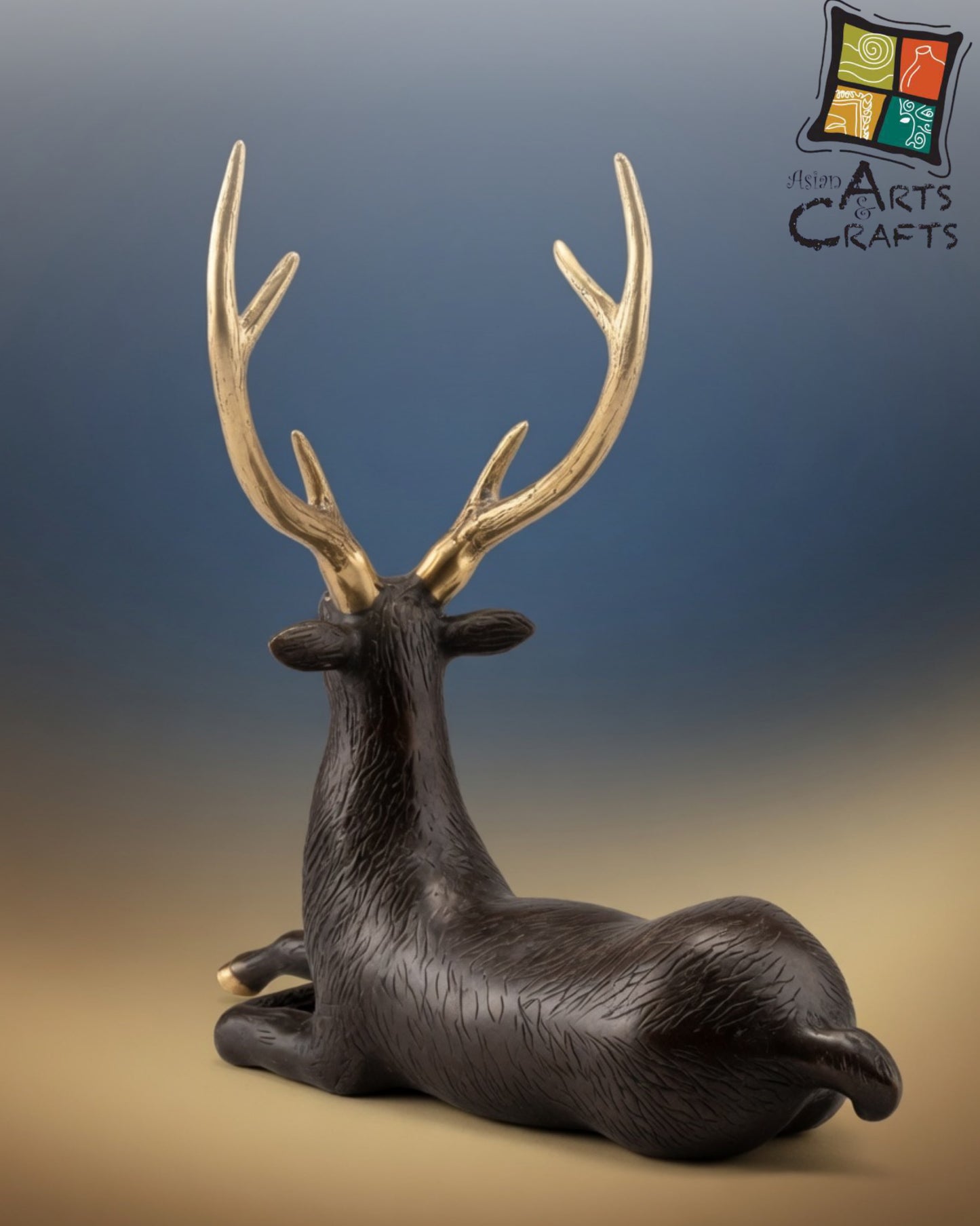 Bronze sitting Deer