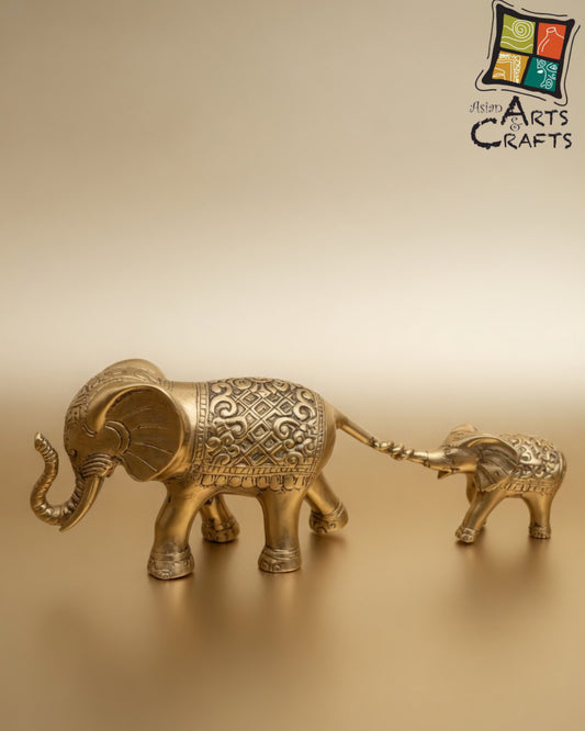 Bronze golden walking elephant with baby