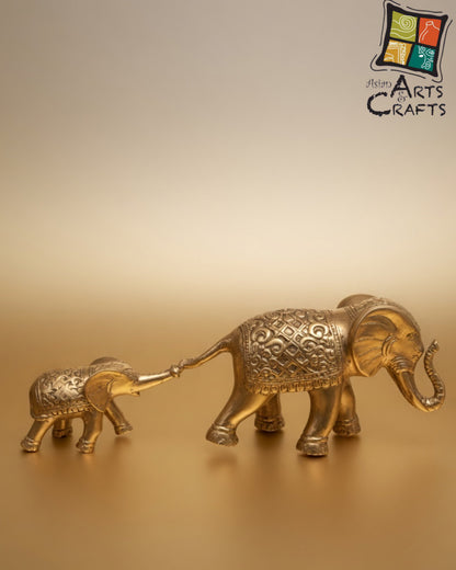 Bronze golden walking elephant with baby
